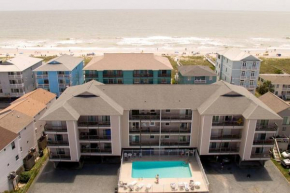 Lovely Condo, Pool, steps to beach, dog friendly,